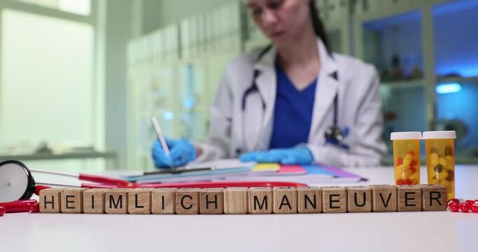 A skilled medical professional demonstrates the Heimlich maneuver effectively within a clinical environment