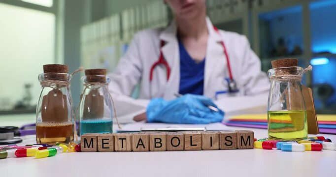 A dedicated researcher studies metabolism in a lab using vials and construction blocks as experimental tools