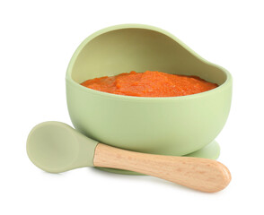 Baby food. Tasty puree in bowl and spoon isolated on white