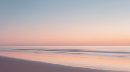 serene beach scene at sunrise featuring smooth sand and endless horizon with generous copy space