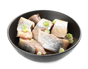 Pieces of delicious herring with green onions isolated on white