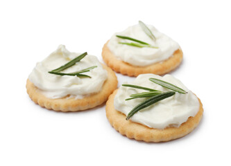 Tasty crackers with cream cheese and rosemary isolated on white