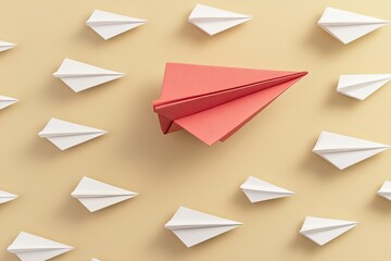 A single, bold origami paper airplane stands out amongst a sea of similar, ordinary ones