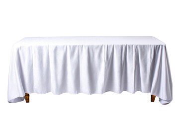 A rectangular wooden table is completely covered by a crisp white tablecloth gracefully draped with soft folds, against a plain white background providing isolation.