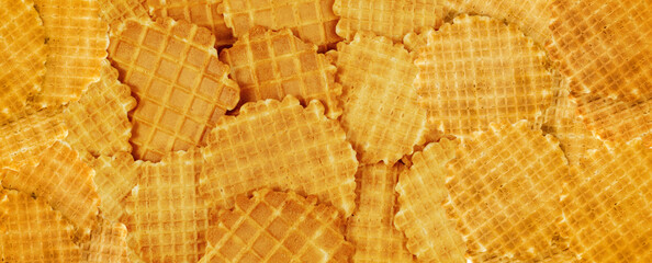 Round waffle pattern. Thin waffled cookie textured background, belgian waffles banner