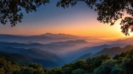 Naklejka premium Majestic mountain range at sunrise framed by trees.