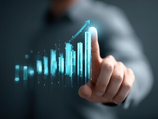 Businessman touching a blue-colored virtual digital bar pointing a finger to the maximum or maximum scale value in the air for a growth concept on a grey background.