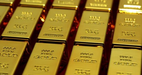 Gold bars arranged in striking grid representing wealth investment opportunities in bank storage. Dynamic nature of financial market and economy