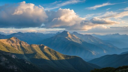 Obraz premium Morning mountain panorama with snowy peaks and cloudy sky