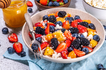 Summer fruit and berry salad with cottage cheese