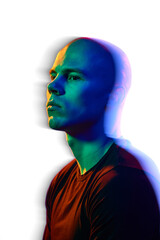 Portrait of handsome serious bald man with focused face posing against white background in...