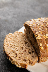 Oat bread oatmeal wholegrain pastry natural food fresh delicious gourmet food background on the table rustic food top view copy space