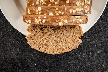 Oat bread oatmeal wholegrain pastry natural food fresh delicious gourmet food background on the table rustic food top view copy space