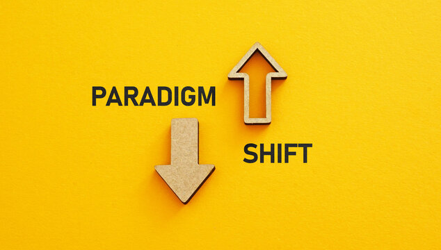 Paradigm shift is shown using the text. New Paradigm Ahead