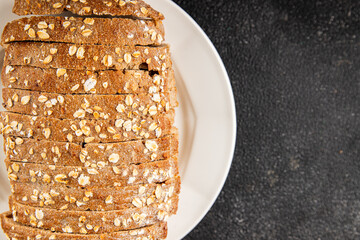 Oat bread oatmeal wholegrain pastry natural food fresh delicious gourmet food background on the table rustic food top view copy space