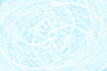 Blue water with ripples on the surface. Defocus blurred transparent blue colored clear calm water...