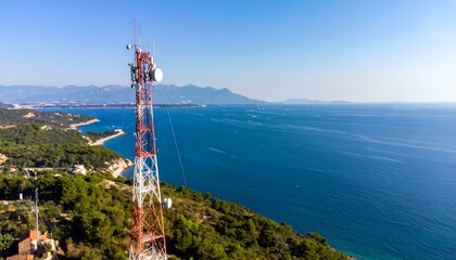 Coastal Communication Tower. A telecommunication tower stands tall against a stunning coastal backdrop.