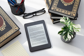 E-book reader device in home library