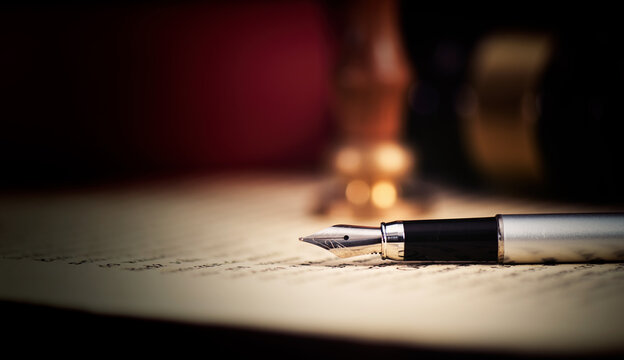 Fountain pen on desk. Notary public