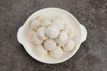 Kue Putri Salju or Snow White Cookies. Made from flour, sugar and butter coated with powdered sugar. 
