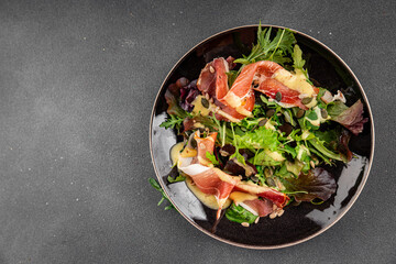 Salad jamon meat green leaf lettuce appetizer natural food fresh delicious gourmet food background on the table rustic food top view copy space keto and paleo diet