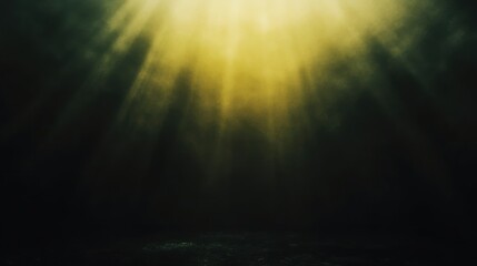 Moody dark background with yellow light rays and atmospheric fog