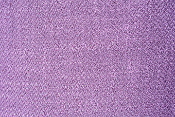 Woven texture of lilac-colored fabric. Abstract textile background