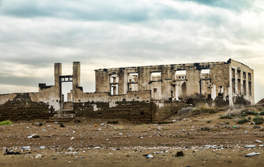 The ruins of a large house by the sea, windstorm