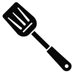A solid black spatula with slotted head and round handle hole is presented