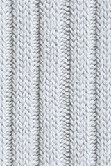 White natural seamless texture of knitted wool textile material background