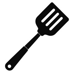 A sleek black spatula with long handle stands out with a simple elegance