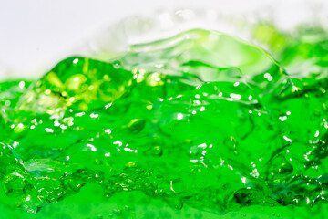 Water wave, close up of vibrant green liquid with bubbles, capturing dynamic movement and freshness. Perfect for backgrounds, beverages, or abstract concepts. soft drink