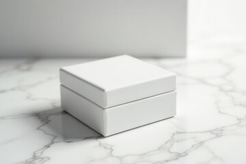 Square white jewelry box on white marble, minimalist aesthetic, detail, square