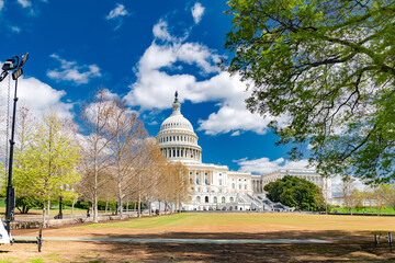 U.S. Congress in Washington, DC. Blue sky and white clouds.