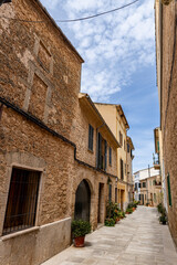 Alcudia is an ancient city on the island of Mallorca with a view of ancient walls, residential buildings