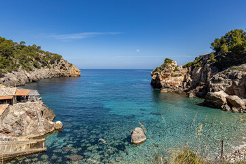 Cala Deia Beach and holiday destination on the Spanish Island of Mallorca with clear Mediterranean...