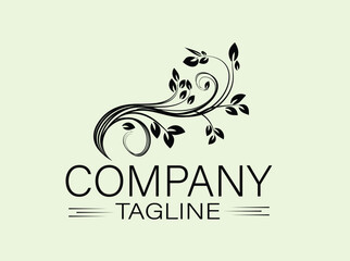 Elegant Black Floral Design Company Tagline Logo on Pale Green Background