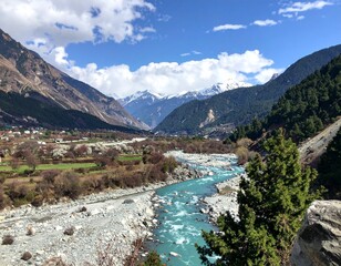 Obraz premium The Baspa River is the heart of Sangla Valley, known for its crystal-clear water and breathtaking mountain scenery.