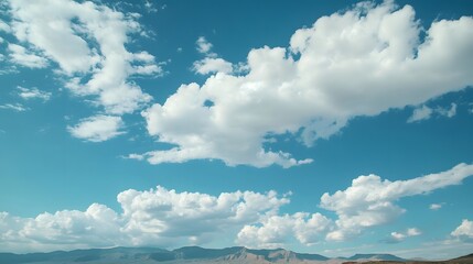 A time-lapse of clouds moving over a mountain range