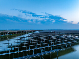 Solar panels at sunset，solar power plant