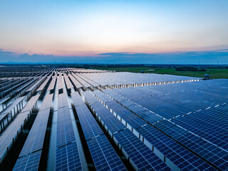 Solar panels at sunset，solar power plant