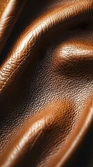 a close up of a brown leather texture