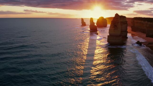Twelve apostles shining during golden sunset over great ocean road