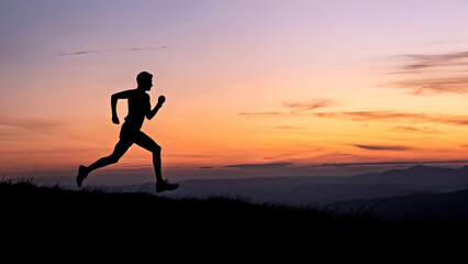 Silhouette of running man on sunset or sunrise background. Active lifestyle, sport, running, training, physical activity concept. Space for text.