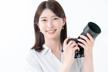 Fotobehang カメラを持つ女性 © naka