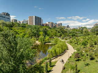 Obraz premium Tbilisi, Georgia - May 7 2025: Aerial view of Mziuri Park in amidst Residential Buildings in Vake district