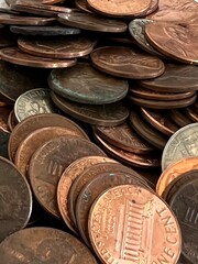 Pile of American money currency coins background mostly pennies 