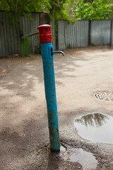 The water pump is outside.