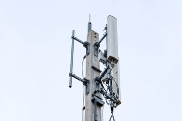 Telecommunication tower or Mobile phone tower with 5G cellular network . Global connection and...