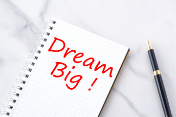 Dream Big, text words typography written on notebook, life and business motivatiobal inspirational concept
